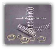 Fuel injection bypass check valve springs and shims.